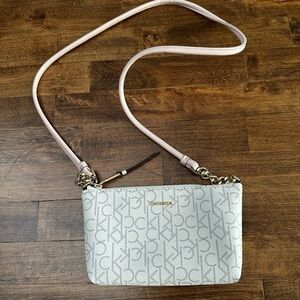 Calvin Klein logo ivory and gray cross body / wristlet bag